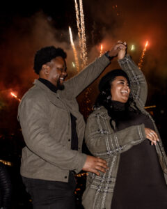 Couple dancing in front of fireworks at Auditorium Shores, Austin