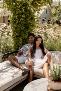 Couple sitting on garden bench at Magnolia in Waco