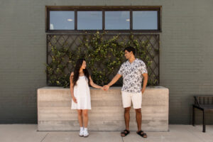 Couple holding hands at Waco engagement session