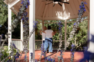 Couple dancing in gazebo during Waco engagement session