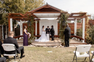 Bride and groom at outdoor wedding ceremony