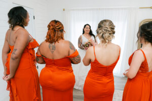 Bridesmaid reveal for first look in bridal suite