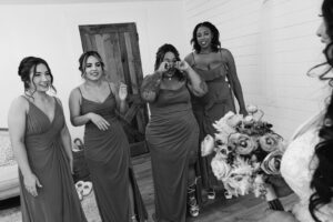 Bridesmaid reveal for first look in bridal suite