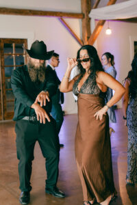 Guests dancing during wedding reception