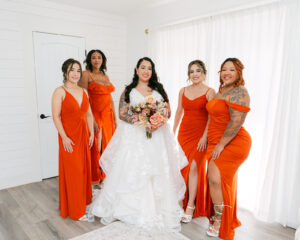 Bridesmaids and bride in bridal suite