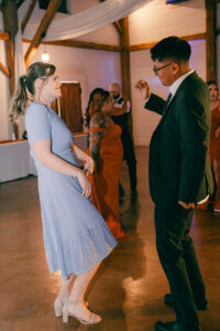 Guests dancing during wedding reception