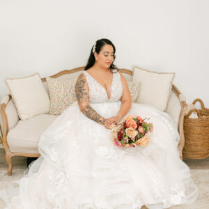 Bride in bridal suite with bouquet