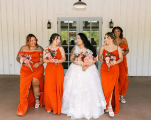 Bridesmaids and bride holding bouquets