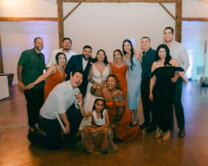 Bride and Groom and guests at wedding reception dancefloor