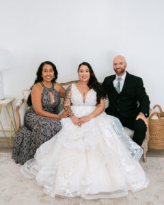 Bride and parents in bridal suite