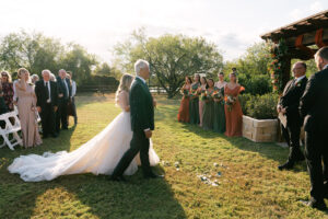Callie + Al Bride and father walking down the aisle