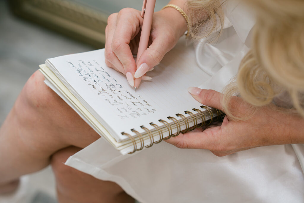Bride writing vows