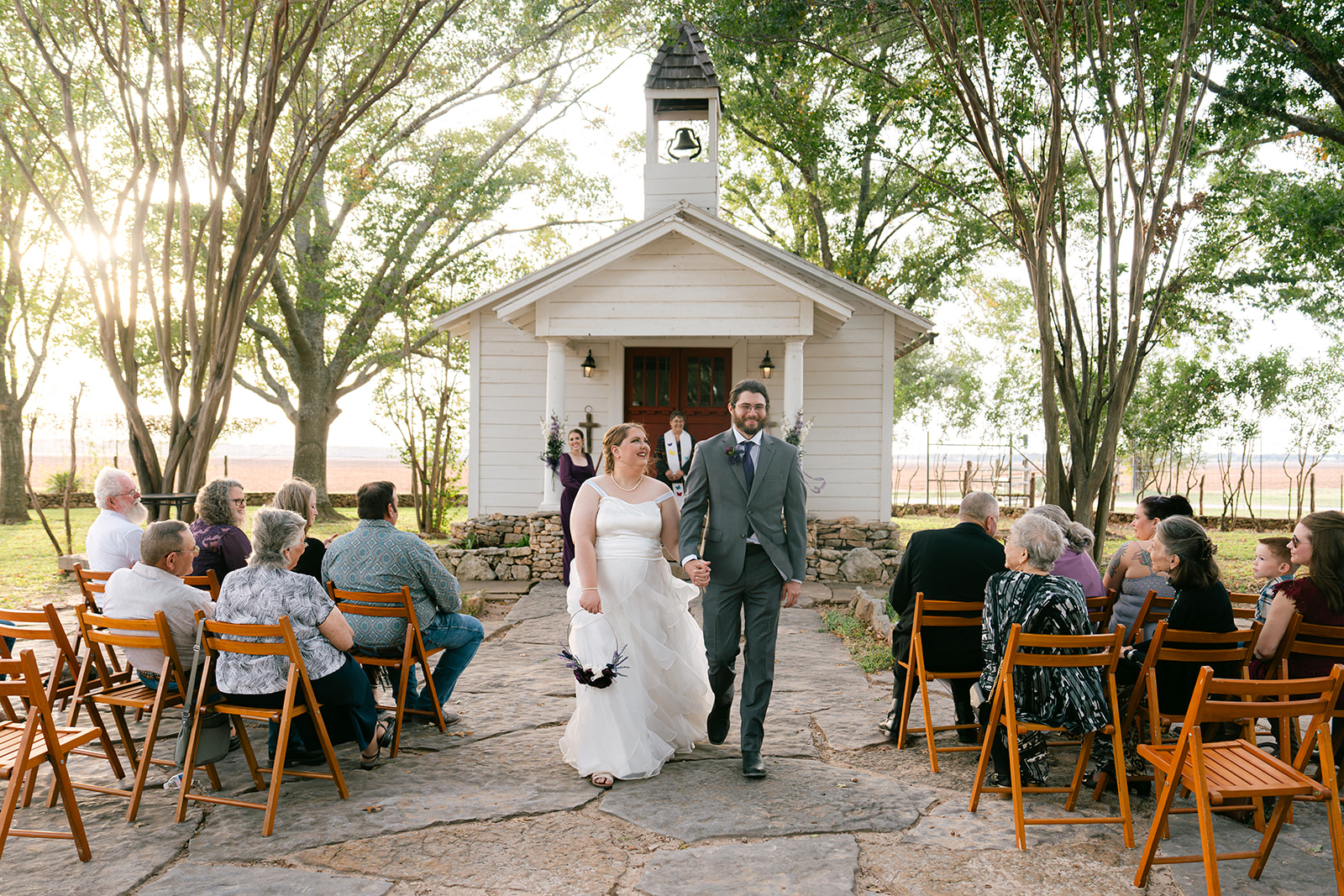 Bride and groom walking down the aisle after ceremony