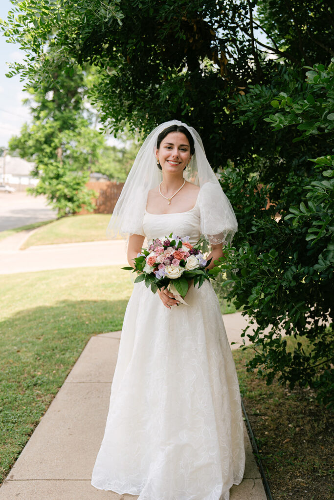 Bride with bouquet and veil